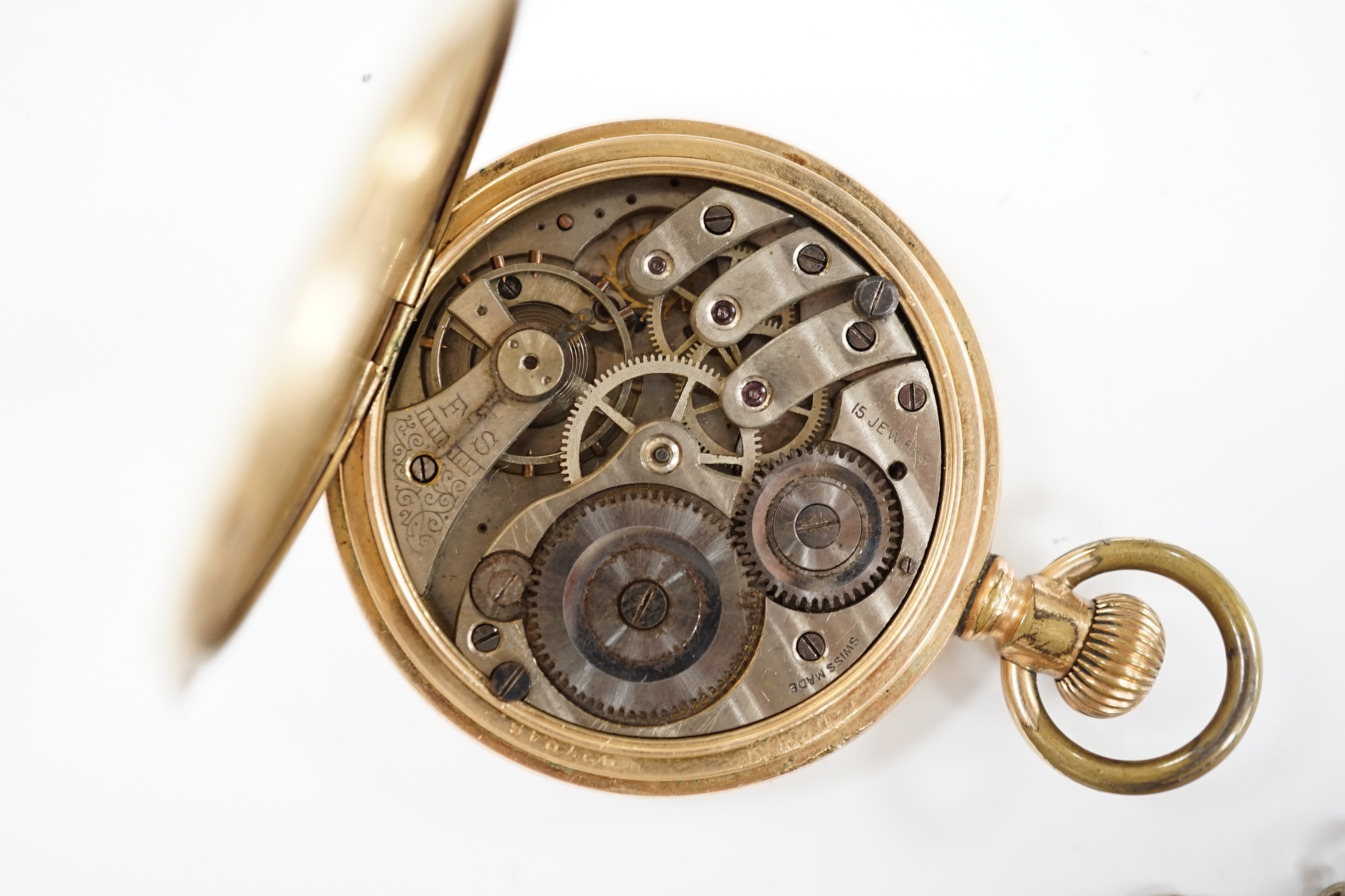 A 1920's silver open face pocket watch and a gold plated hunter pocket watch.